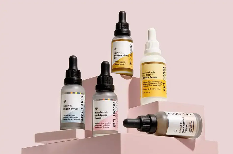 Collection of Boost Lab products on a pink background