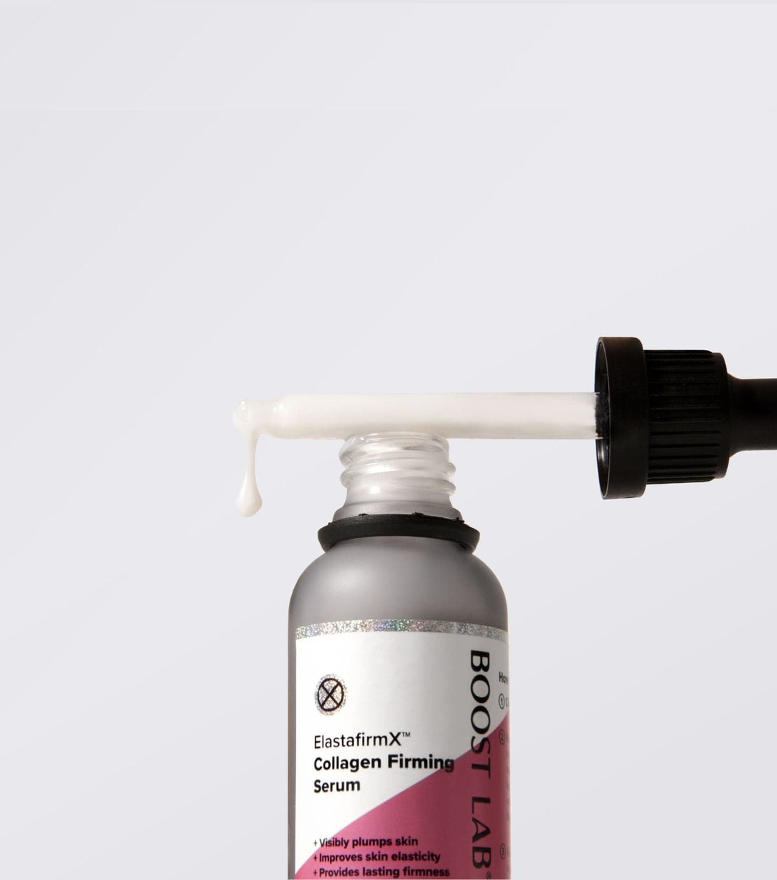 Collagen firming serum and dropper on white background.